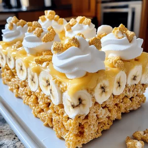 To make Banana Pudding Rice Krispie Treats, gather these simple ingredients. Each one plays a key role in creating this delightful snack. - 6 cups Rice Krispies cereal - 1 cup mini marshmallows - 1/2 cup unsalted butter - 1 cup banana pudding mix - 1/2 cup milk - 1 teaspoon vanilla extract - 1 cup sliced ripe bananas - 1/2 cup whipped cream (optional) - Crushed graham crackers (for garnish) These ingredients blend to form a sweet, chewy treat. The Rice Krispies add crunch. Mini marshmallows bring sweetness and stickiness. Unsalted butter helps everything stick together. The banana pudding mix gives flavor and creaminess. Milk adds moisture for a soft texture. Vanilla extract enhances the taste. Ripe bananas add freshness and fruity notes. Whipped cream can top the treats for extra fun. Finally, crushed graham crackers provide a nice crunch on top. You can find the full recipe in the recipe section. This list is easy to follow and fun to prepare! 1. Melting the butter and marshmallows Start by grabbing a large saucepan. Place it over low heat. Add the unsalted butter. Let it melt slowly. Once the butter melts, add the mini marshmallows. Keep stirring until they melt completely. The mixture should be smooth and creamy. 2. Mixing in the banana pudding and cereal Remove the saucepan from the heat. Now, add the banana pudding mix and milk. Stir well to combine. You want a thick, creamy mixture. Next, add the Rice Krispies cereal. Mix it in gently. Make sure every piece of cereal is coated with the gooey goodness. 3. Folding in the bananas Take your ripe bananas and slice them into small pieces. Gently fold them into the mixture. Be careful not to mash the bananas. You want them to stay chunky for texture and flavor. 1. Preparing the baking pan Grab a 9x13-inch baking pan. Lightly grease it with butter or cooking spray. This helps the treats come out easily later. 2. Pouring and pressing the mixture Pour the Rice Krispies mixture into the prepared pan. Use a spatula to press it down firmly. Make sure it forms an even layer. This step is key for nice, even treats. 3. Cooling and cutting the treats Let the mixture cool at room temperature for about 30 minutes. Once it is set, cut it into squares. If you want, add a dollop of whipped cream and sprinkle crushed graham crackers on top. This adds a nice crunch and extra flavor. For the full recipe, check out the details above. Enjoy your Banana Pudding Rice Krispie Treats! To make the best Banana Pudding Rice Krispie Treats, follow these simple tips: - Ensure marshmallows are fully melted: Start with low heat when melting butter. Add mini marshmallows right after the butter melts. Stir until they turn smooth and creamy. This step is key for the best texture. - Properly fold in ingredients to maintain texture: When mixing in the Rice Krispies, use a gentle hand. Stir carefully to coat every piece. When adding bananas, fold them in slowly to keep them intact. This helps keep your treats light and fluffy. Make your treats even more fun with these serving ideas: - Ideas for topping and presentation: After cutting the treats into squares, consider adding a dollop of whipped cream on top. Sprinkle crushed graham crackers for a nice crunch. You can even place a slice of banana on top for a cute touch. - Pairing with a beverage or complementary dessert: These treats go well with milk or a banana smoothie. You could also serve them with a scoop of vanilla ice cream. The creamy flavors will balance nicely with the banana pudding taste. Enjoy making and sharing these delicious Banana Pudding Rice Krispie Treats! For the full recipe, don't forget to check out the details above. {{image_2}} You can change the flavor of your Banana Pudding Rice Krispie Treats easily. Here are some fun ideas: - Adding chocolate chips: Mix in 1 cup of chocolate chips for a sweet twist. The chocolate pairs well with banana. It adds a rich layer of flavor to each bite. - Incorporating nuts or coconut: You can add 1/2 cup of chopped nuts or shredded coconut. Nuts give a nice crunch. Coconut adds a tropical flair, making your treats even more exciting. You can adapt this recipe to fit different diets. Here are a couple of adjustments you can try: - Gluten-free alternatives: Use gluten-free Rice Krispies. This keeps your treats safe for those with gluten issues. Always check the label to ensure they are certified gluten-free. - Vegan adjustments: Replace the butter with coconut oil or vegan butter. Use plant-based milk instead of cow's milk. This way, you can enjoy the treats without animal products. These variations and adjustments make the recipe fun and accessible for everyone. For the complete recipe, check out the [Full Recipe]. To keep your Banana Pudding Rice Krispie Treats fresh, store them properly. You can keep them at room temperature for a short time. Place them in an airtight container. This helps prevent them from getting hard or stale. Make sure to separate layers with parchment paper. This keeps them from sticking together. If you want to store them longer, refrigeration is a great option. Place the treats in the fridge in an airtight container. This helps them last a bit longer. Just remember to let them sit at room temperature for a few minutes before serving. This will make them softer and easier to enjoy. These treats are best enjoyed fresh, but they can last a while. At room temperature, they stay good for about 2 to 3 days. In the fridge, they can last up to a week. Check for signs of spoilage, like a change in smell or texture. If they become hard or dry, it’s time to toss them. Enjoy them while they are still soft and tasty! Can I use instant banana pudding instead? Yes, you can use instant banana pudding. It adds a strong banana flavor. Mix it into the melted marshmallow and butter as you would with the regular pudding mix. How can I make these treats without marshmallows? You can replace marshmallows with peanut butter or melted chocolate. These options will still bind the Rice Krispies together. Just warm them until they are smooth and mix them in. Can I freeze Banana Pudding Rice Krispie Treats? Yes, you can freeze these treats. Wrap them tightly in plastic wrap and place them in a freezer bag. They can last up to two months in the freezer. Troubleshooting common issues If your treats are too sticky, try adding a bit more Rice Krispies. If they fall apart, mix in more melted butter or marshmallow. This will help them stick better. Suggestions for enhancing flavor and texture Add a pinch of cinnamon or nutmeg for warmth. You can also mix in mini chocolate chips for a sweet twist. Top with crushed graham crackers for extra crunch. This blog covered how to make delicious Banana Pudding Rice Krispie Treats. You learned the key ingredients, preparation steps, and tips for great results. We explored fun variations and storage methods too. These treats are easy to make and always a hit. Feel free to be creative with flavors and toppings. Whether you share them or enjoy them yourself, these treats will bring joy. Happy cooking!