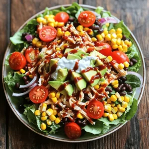 - 2 cups cooked chicken breast, shredded - 1 cup cherry tomatoes, halved - 1 cup corn (fresh or canned) - 1/2 cup black beans, rinsed and drained - 1 red bell pepper, diced - 1/4 cup red onion, finely chopped - 1 cup mixed greens (spinach, arugula, etc.) - 1/2 cup Greek yogurt - 1/4 cup barbecue sauce (low-sugar if desired) - 1 tablespoon lime juice - Salt and pepper to taste - Optional: 1/4 cup sliced avocado for garnish Gather these ingredients before cooking. Each item adds unique flavor and nutrition. The cooked chicken breast is the star. It offers high protein and keeps you full. Cherry tomatoes add sweetness and color. Corn brings a nice crunch and fiber. Black beans boost protein and fiber too. Red bell pepper adds a zesty crunch. Red onion gives a sharp bite. Mixed greens provide freshness and nutrition. Greek yogurt makes a creamy dressing that's healthier than mayonnaise. Barbecue sauce adds a smoky sweetness. Lime juice brightens the flavors. Lastly, salt and pepper enhance everything. You can also add avocado for creaminess if you like. For the full recipe, check the details above. First, you need to shred your cooked chicken. Use two forks to pull it apart into small pieces. This part is easy and fun! Next, chop your veggies. - Cut the cherry tomatoes in half. - Dice the red bell pepper into small chunks. - Finely chop the red onion. Add the corn and black beans, rinsed and drained, to the mix. Your prep work is almost done! In a small bowl, combine the Greek yogurt, barbecue sauce, and lime juice. Mix them well until you have a smooth dressing. This blend gives your salad a tasty kick! Don't forget to add salt and pepper to enhance the flavor. In a large mixing bowl, toss together the shredded chicken and all the veggies. Pour the dressing over this mixture and gently toss until everything is well coated. For serving, lay a bed of mixed greens on a platter or in bowls. Spoon the BBQ chicken mixture on top of the greens. If you want, add sliced avocado for a creamy touch. Enjoy your fresh and high-protein BBQ chicken salad! For the full recipe, check the detailed steps provided earlier. Pick a low-sugar BBQ sauce for a healthier option. Look for sauces that use natural sweeteners. These sauces keep the flavor without too many added sugars. You can also try homemade sauces. Mix tomato paste, vinegar, and spices for a fun twist. This gives you full control over the taste and ingredients. Want more protein? Add chickpeas or nuts to your salad. Chickpeas boost fiber and protein. Nuts like almonds or walnuts add crunch. They also provide healthy fats. This makes your salad more filling and nutritious. You can even mix in some cottage cheese for a creamy texture and more protein. Balancing textures and flavors is key. Use crisp veggies like bell peppers and fresh greens. These add crunch and color. Pair them with the tender chicken for a great mix. Add a squeeze of lime for brightness. This enhances the taste and freshness of the salad. For a creamy touch, add sliced avocado on top. It makes the dish even more satisfying. For more details, check out the Full Recipe. {{image_2}} You can switch up the protein in your BBQ chicken salad. Turkey works well. It has a similar taste but is leaner. You can also try tofu if you want a plant-based option. Tofu absorbs flavors nicely and adds protein. Shrimp is another great choice. It cooks quickly and adds a fun twist to your salad. Feel free to add fun ingredients to your salad. Fruits like mango or pineapple bring sweetness. These can balance the BBQ flavor. You might also add cheese, like feta or cheddar. Cheese adds creaminess and flavor. Don’t forget about nuts! Chopped walnuts or almonds add crunch and healthy fats. If you want a meatless salad, it’s easy to make swaps. Use chickpeas or black beans for protein. They are filling and tasty. You can also add more veggies, like cucumbers or carrots. For a creamy texture, try avocado in place of chicken. This way, you still get a delicious, satisfying meal. For the full recipe, click here: [Full Recipe]. To keep your High Protein BBQ Chicken Salad fresh, use airtight containers. Glass or BPA-free plastic containers work best. Store the salad in the fridge for up to three days. If you have dressing left, store it separately. This keeps the greens crisp. You can enjoy this salad cold or warm. If you prefer warm, gently reheat the chicken in a microwave. Use a microwave-safe dish and cover it to keep moisture in. Heat for 30 seconds, then stir. Repeat until warm, but don’t overheat. Prep your ingredients in advance for quick meals. Cook and shred the chicken a day before. Chop the veggies and store them in separate containers. Mix the dressing and keep it in a jar. This way, you can assemble your salad in minutes. For freshness, add the greens just before serving. You can make this salad healthier by using low-calorie dressings. Try balsamic vinaigrette or lemon juice. Adding extra greens is also a great idea. You can include kale, romaine, or even arugula. These greens boost nutrients and fiber. They also add crunch and flavor. Yes, you can use frozen chicken! First, thaw it safely in the fridge overnight. You can also use the microwave for quick thawing. Just make sure to cook it right after. Cooked chicken should reach 165°F for safety. Once cooked, shred it for the salad. If you want a dairy-free option, try using avocado instead. You can also use silken tofu for a creamy texture. Sour cream or mayo can work too, but they are less healthy. Choose a substitute that fits your diet best. You learned how to make a tasty high-protein BBQ chicken salad. We covered essential ingredients, easy steps, and useful tips. You can customize this salad with proteins, veggies, or dressings. Remember to store leftovers properly for later enjoyment. By following these tips, you can build a delicious and healthy meal. Enjoy your cooking and get creative with your flavors!