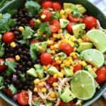 For my Quick Southwest Chicken Salad, you'll need some fresh and tasty components. Here’s what you need: - 2 cups cooked chicken breast, shredded - 1 can (15 oz) black beans, rinsed and drained - 1 cup corn kernels (fresh, canned, or frozen) - 1 bell pepper (red or yellow), diced - 1 cup cherry tomatoes, halved - 1 small red onion, finely chopped - 1 avocado, diced - 1/4 cup fresh cilantro, chopped These ingredients create a colorful mix. The chicken adds protein, while the beans and corn give fiber and flavor. Bell peppers and tomatoes add crunch and sweetness. The avocado brings creaminess, and cilantro adds freshness. Now, let’s talk about the dressing. It brings everything together and adds zest. You will need: - Juice of 2 limes - 3 tablespoons olive oil - 1 teaspoon cumin - 1 teaspoon chili powder - Salt and pepper to taste This dressing is simple yet flavorful. The lime juice gives a tangy kick. Olive oil adds richness, while cumin and chili powder bring warmth. Salt and pepper enhance all the flavors. You can take your salad to the next level with some fun toppings. Here are a few ideas: - Crumbled feta cheese for a salty bite - Sliced jalapeños for a spicy kick - Tortilla chips for crunch Adding these toppings can change the taste and texture. You can mix and match based on your taste. Enjoy experimenting and make it your own! For the full recipe, check out the details provided. Start by gathering all your ingredients. In a large mixing bowl, combine 2 cups of shredded chicken, 1 can of black beans, 1 cup of corn, 1 diced bell pepper, 1 cup of halved cherry tomatoes, and 1 small chopped red onion. This mix gives a nice balance of protein and veggies. Make sure to rinse the black beans to remove any salt. This helps keep the salad fresh and clean. In a separate small bowl, whisk together the juice of 2 limes, 3 tablespoons of olive oil, 1 teaspoon of cumin, 1 teaspoon of chili powder, and a pinch of salt and pepper. Whisk until smooth. This dressing brings a zesty kick to the salad. The lime juice adds freshness, while cumin and chili powder give it flavor depth. Now, pour the dressing over the salad base. Gently toss the salad to coat all the ingredients evenly. Carefully add 1 diced avocado and 1/4 cup of chopped cilantro. Toss lightly to avoid mashing the avocado. Taste your salad and adjust seasoning with more lime juice or salt if needed. You can serve it right away or chill it for 30 minutes to let the flavors blend. Enjoy your fresh and tasty dish! For the full recipe, check the details above. To shred chicken well, use two forks. Hold one fork steady and pull with the other. You can also use your hands if the chicken is cool. For best results, shred the chicken when it’s warm. This keeps it moist and easy to break apart. You can also use a stand mixer. Just mix on low for a quick shred. Add more flavor to the salad by trying these tips: - Add lime zest: It brightens the taste. - Use smoked paprika: This gives a nice smoky kick. - Include jalapeños: For heat, add diced jalapeños. - Mix in cheese: Crumbled feta or shredded cheddar works well. - Try different herbs: Use parsley or mint for a fresh twist. These small changes can take your salad to new heights. Make your salad look great when you serve it. Here are some tips: - Use a large, colorful bowl to show off your salad. - Layer ingredients for a beautiful display. - Top with extra cilantro and lime wedges. - Serve it on individual plates for a nice touch. - Add chips or tortillas on the side for crunch. These simple touches will impress your guests and make the meal more inviting. For the full recipe, check out the details above. {{image_2}} You can easily make this salad vegetarian or vegan. To start, swap out the chicken. Use cooked quinoa or roasted chickpeas instead. Both options add great texture and protein. For a vegan dressing, replace olive oil with avocado oil. Use lime juice to keep the bright flavor. These changes keep the salad light and fresh. If you love heat, add jalapeños or hot sauce to your salad. Chop fresh jalapeños and mix them in for a spicy kick. You can also sprinkle in red pepper flakes. If you prefer a milder flavor, skip the spicy ingredients. This salad is flexible and can fit any taste. Don’t have all the ingredients? No problem! Swap black beans for kidney beans or pinto beans. You can use any color of bell pepper, too. Frozen corn works just as well as fresh. If you can't find cilantro, parsley makes a nice substitute. These swaps still keep the meal delicious and colorful. For more ideas, check out the Full Recipe for inspiration on how to customize this dish! Store your Quick Southwest Chicken Salad in an airtight container. This keeps it fresh and safe. It lasts for up to three days in the fridge. Keep the avocado out if you plan to store it. Add it just before serving to keep it from browning. You can freeze the salad, but it's best without the avocado. Place the salad in a freezer-safe container. It can stay in the freezer for up to three months. When you're ready to eat it, thaw it in the fridge overnight. You can enjoy this salad cold or at room temperature. If you want to warm it, heat only the chicken part. Use a microwave-safe dish and heat in short bursts. Stir in between to ensure even warming. Always add fresh avocado and cilantro after reheating for the best taste. For the full recipe, check the recipe section. You can prepare the salad a day ahead. Just follow the recipe steps. Mix the salad base without the avocado. Store it in the fridge in an airtight container. When you're ready to serve, add the diced avocado and dressing. This keeps the avocado fresh and green. You can use cooked turkey or tofu as a substitute. Shredded rotisserie chicken works well too. For a plant-based option, try chickpeas or tempeh. Both options add protein and flavor. Using these alternatives will give you tasty results. Yes, canned beans are perfect for this salad. They save time and are easy to use. Just rinse and drain them before adding to the salad. Canned beans make the recipe quick and simple. You’ll still enjoy all the great flavors in this dish. This blog post covered how to make a Quick Southwest Chicken Salad. We discussed main ingredients, dressing components, and tasty toppings. You learned step-by-step instructions for preparing the salad and making the dressing. I also shared tips to make the chicken easy to shred and ideas for presentation. You can adapt this recipe for different diets and adjust the spice level. Remember, storing your salad properly keeps it fresh. Creating this salad can be fun and fast. Try it out and enjoy!